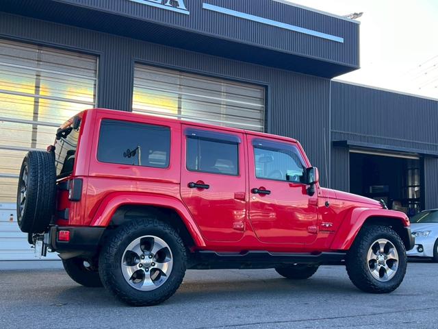 ジープ・ラングラーアンリミテッド サハラ　正規ディーラー車　実走行車両　ユーザー様委託車両　背面タイヤ　カロッツェリアナビ　Ｂカメラ＆サイドカメラ　３ナンバー（7枚目）