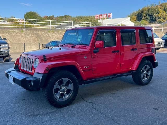 ジープ・ラングラーアンリミテッド サハラ　正規ディーラー車　実走行車両　ユーザー様委託車両　背面タイヤ　カロッツェリアナビ　Ｂカメラ＆サイドカメラ　３ナンバー（9枚目）