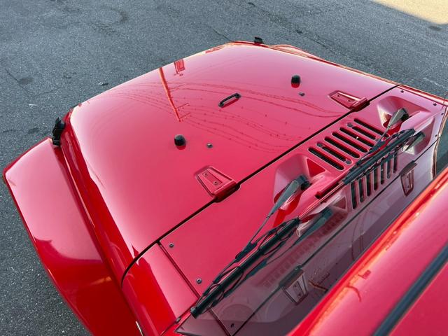 ジープ・ラングラーアンリミテッド サハラ　正規ディーラー車　実走行車両　ユーザー様委託車両　背面タイヤ　カロッツェリアナビ　Ｂカメラ＆サイドカメラ　３ナンバー（19枚目）