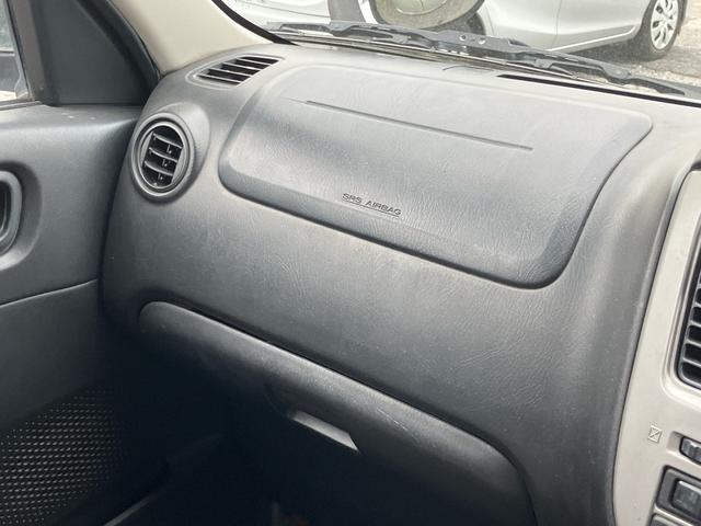 キャラバンコーチ GX キーレス パワーステアリング 衝突安全ボディ エアコン スライドドア パワーウィンドウ 3列シート ABS(26枚目)