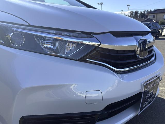 シャトル ハイブリッド　ホンダセンシング　ＬＤＡ　１オーナー　スマートキープッシュスタート　禁煙車　デュアルエアバッグ　横滑り防止　パワステ　盗難防止　パワーウインドウ　衝突安全ボディ　キーレス　ＡＢＳ　エコモード　オートクルーズ（12枚目）