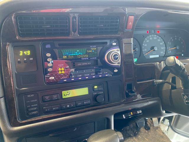 ハイエースワゴン リビングサルーンEX/両側スライドドア/サンルーフ/ETC 電動格納ミラー スペアタイヤ ETC 3列シート パワーウィンドウ パワーステアリング サンルーフ ABS エアコン 両側スライドドア(10枚目)