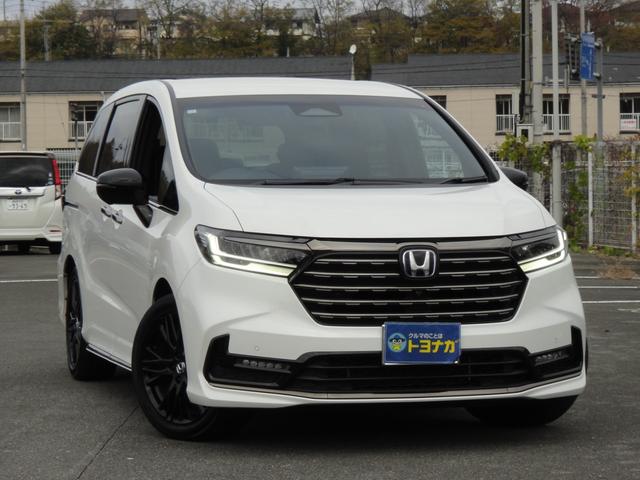 オデッセイハイブリッド ｅ：ＨＥＶアブソルート・ＥＸブラックエディション　純正１１．４インチコネクトナビＤＴＶ　純正１５．６インチ後席モニター　マルチビューカメラ　ブラックレザーシート　１・２列シートヒーター　２列目両側アームレスト付４ウェイパワーシート　ディーラーデモカー（4枚目）