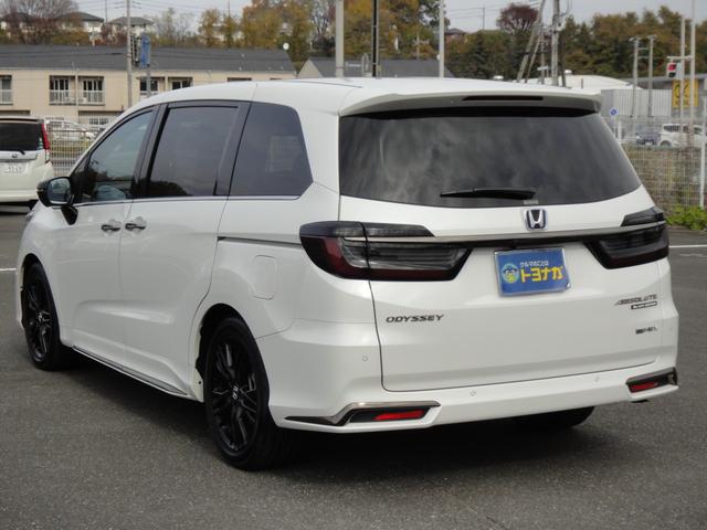 オデッセイハイブリッド ｅ：ＨＥＶアブソルート・ＥＸブラックエディション　純正１１．４インチコネクトナビＤＴＶ　純正１５．６インチ後席モニター　マルチビューカメラ　ブラックレザーシート　１・２列シートヒーター　２列目両側アームレスト付４ウェイパワーシート　ディーラーデモカー（9枚目）