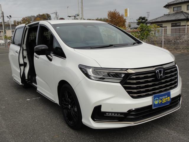 オデッセイハイブリッド ｅ：ＨＥＶアブソルート・ＥＸブラックエディション　純正１１．４インチコネクトナビＤＴＶ　純正１５．６インチ後席モニター　マルチビューカメラ　ブラックレザーシート　１・２列シートヒーター　２列目両側アームレスト付４ウェイパワーシート　ディーラーデモカー（10枚目）