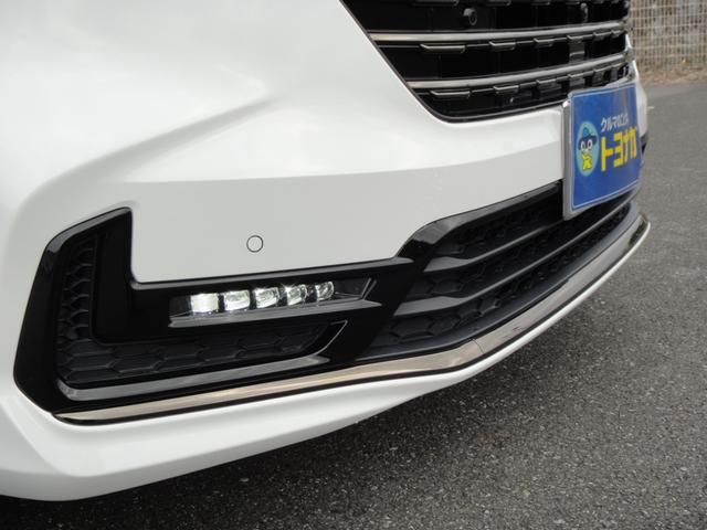 オデッセイハイブリッド ｅ：ＨＥＶアブソルート・ＥＸブラックエディション　純正１１．４インチコネクトナビＤＴＶ　純正１５．６インチ後席モニター　マルチビューカメラ　ブラックレザーシート　１・２列シートヒーター　２列目両側アームレスト付４ウェイパワーシート　ディーラーデモカー（14枚目）