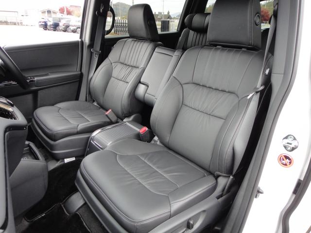 オデッセイハイブリッド ｅ：ＨＥＶアブソルート・ＥＸブラックエディション　純正１１．４インチコネクトナビＤＴＶ　純正１５．６インチ後席モニター　マルチビューカメラ　ブラックレザーシート　１・２列シートヒーター　２列目両側アームレスト付４ウェイパワーシート　ディーラーデモカー（28枚目）