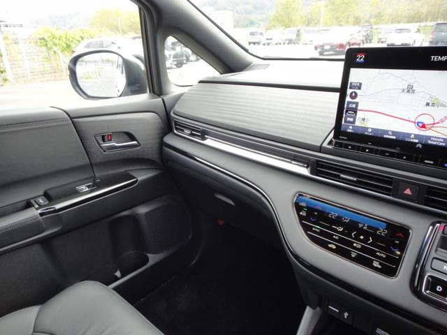 オデッセイハイブリッド ｅ：ＨＥＶアブソルート・ＥＸブラックエディション　純正１１．４インチコネクトナビＤＴＶ　純正１５．６インチ後席モニター　マルチビューカメラ　ブラックレザーシート　１・２列シートヒーター　２列目両側アームレスト付４ウェイパワーシート　ディーラーデモカー（66枚目）
