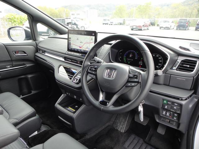 オデッセイハイブリッド ｅ：ＨＥＶアブソルート・ＥＸブラックエディション　純正１１．４インチコネクトナビＤＴＶ　純正１５．６インチ後席モニター　マルチビューカメラ　ブラックレザーシート　１・２列シートヒーター　２列目両側アームレスト付４ウェイパワーシート　ディーラーデモカー（67枚目）