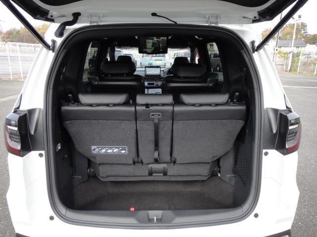 オデッセイハイブリッド ｅ：ＨＥＶアブソルート・ＥＸブラックエディション　純正１１．４インチコネクトナビＤＴＶ　純正１５．６インチ後席モニター　マルチビューカメラ　ブラックレザーシート　１・２列シートヒーター　２列目両側アームレスト付４ウェイパワーシート　ディーラーデモカー（75枚目）