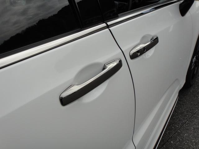 オデッセイハイブリッド ｅ：ＨＥＶアブソルート・ＥＸブラックエディション　純正１１．４インチコネクトナビＤＴＶ　純正１５．６インチ後席モニター　マルチビューカメラ　ブラックレザーシート　１・２列シートヒーター　２列目両側アームレスト付４ウェイパワーシート　ディーラーデモカー（80枚目）