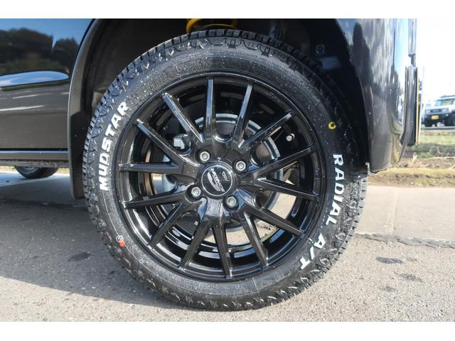 DX GLエマージェンシーブレーキパッケージ 4WD リフトアップ 新品14インチアルミ 新品MUDSTAR ATタイヤ オートライト セーフティーサポート リア障害物センサー CDオーディオ AUX オーバーヘッドシェルフ 届出済未使用車(8枚目)