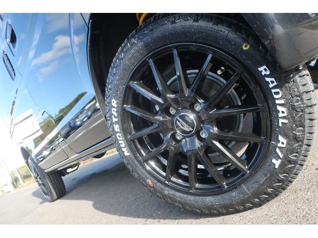 DX GLエマージェンシーブレーキパッケージ 4WD リフトアップ 新品14インチアルミ 新品MUDSTAR ATタイヤ オートライト セーフティーサポート リア障害物センサー CDオーディオ AUX オーバーヘッドシェルフ 届出済未使用車(77枚目)