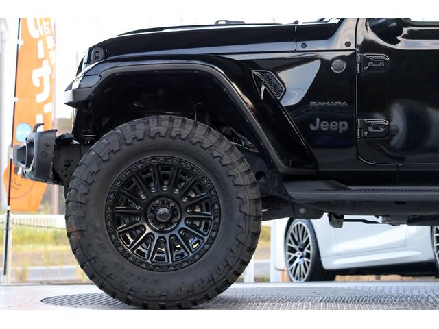 ジープ・ラングラーアンリミテッド サハラ フューエルオフロード20インチブラックAW・ラフカントリーリフトアップ・USルビコンスタイルフロントバンパー・Smittybiltスペアタイヤキャリア・前後センサー・前後カメラ・LEDライト・黒革・(25枚目)