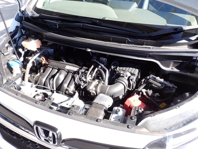 フリード+ハイブリッド ハイブリッドG・ホンダセンシング Cパッケージ 9インチプレミアムインターナビ フルセグTV バックカメラ ビルトインETC ナビ連動前後ドライブレコーダー シートヒーター 両側パワースライドドア LEDヘッドランプ(9枚目)