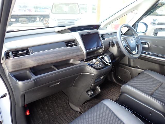 フリード+ハイブリッド ハイブリッドG・ホンダセンシング Cパッケージ 9インチプレミアムインターナビ フルセグTV バックカメラ ビルトインETC ナビ連動前後ドライブレコーダー シートヒーター 両側パワースライドドア LEDヘッドランプ(11枚目)