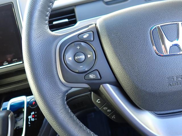 フリード+ハイブリッド ハイブリッドG・ホンダセンシング Cパッケージ 9インチプレミアムインターナビ フルセグTV バックカメラ ビルトインETC ナビ連動前後ドライブレコーダー シートヒーター 両側パワースライドドア LEDヘッドランプ(16枚目)