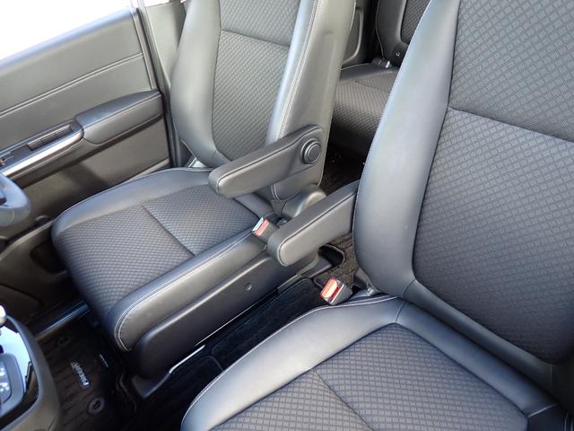 フリード+ハイブリッド ハイブリッドG・ホンダセンシング Cパッケージ 9インチプレミアムインターナビ フルセグTV バックカメラ ビルトインETC ナビ連動前後ドライブレコーダー シートヒーター 両側パワースライドドア LEDヘッドランプ(28枚目)