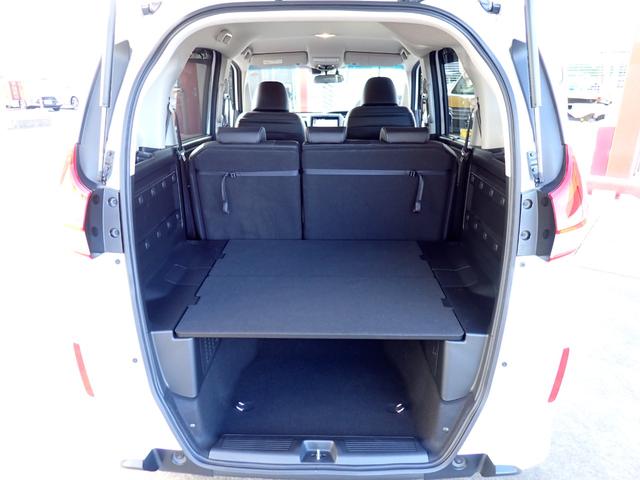 フリード+ハイブリッド ハイブリッドG・ホンダセンシング Cパッケージ 9インチプレミアムインターナビ フルセグTV バックカメラ ビルトインETC ナビ連動前後ドライブレコーダー シートヒーター 両側パワースライドドア LEDヘッドランプ(32枚目)