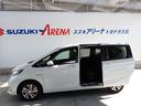 フリード+ハイブリッド ハイブリッドG・ホンダセンシング Cパッケージ 9インチプレミアムインターナビ フルセグTV バックカメラ ビルトインETC ナビ連動前後ドライブレコーダー シートヒーター 両側パワースライドドア LEDヘッドランプ(7枚目)