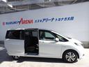 フリード+ハイブリッド ハイブリッドG・ホンダセンシング Cパッケージ 9インチプレミアムインターナビ フルセグTV バックカメラ ビルトインETC ナビ連動前後ドライブレコーダー シートヒーター 両側パワースライドドア LEDヘッドランプ(8枚目)
