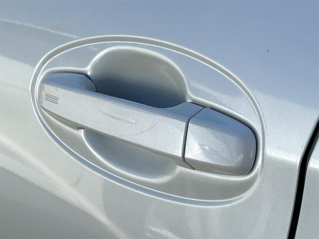 ヴィッツ F スマイルエディション ナビ TV オートライト スマートキー 電動格納ミラー CVT 盗難防止システム 衝突安全ボディ ABS ミュージックプレイヤー接続可 Bluetooth エアコン パワーステアリング(30枚目)