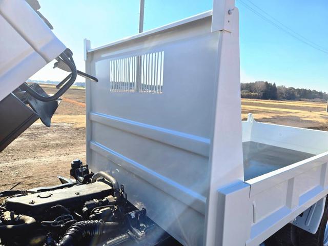 エルフトラック 　平成１８年式　標準　低床　ダンプ　ＰＢ－ＮＫＲ８１ＡＤ　４ＨＬ１　１２８ＰＳ　最大積載量３０００ｋｇ　車輌総重量６０２５ｋｇ　５ＭＴ　ＡＣ　ＰＳ　ＰＷ　ＡＢＳ　エアバッグ　左電動格納ミラー（43枚目）