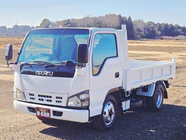 エルフトラック 　平成１８年式　標準　低床　ダンプ　ＰＢ－ＮＫＲ８１ＡＤ　４ＨＬ１　１２８ＰＳ　最大積載量３０００ｋｇ　車輌総重量６０２５ｋｇ　５ＭＴ　ＡＣ　ＰＳ　ＰＷ　ＡＢＳ　エアバッグ　左電動格納ミラー（77枚目）