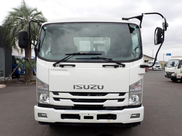 フォワード 　２５－７　４ｔ　ダンプ　極東製　ベッドなし　３ペダル　ＥＴＣ　アオリ一方開　手動コボレーン　スロープハンガー　スタッドレスタイヤ　抹消積載３６００ｋｇ　ボディ内寸長３４０幅２０５ｃｍ（64枚目）