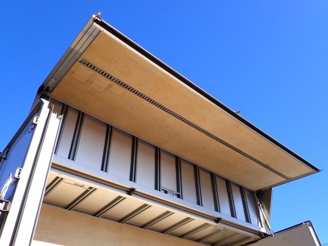 ヒノレンジャー 　☆２５－３７　４ｔ　ワイド　トランテックス製　アルミウィング　跳上式パワーゲート　新明和　観音扉　３ペダル　ベッド付　ラッシングレール２段　床引出フック５対　ＥＴＣ　バックカメラ　抹消積載２７００ｋｇ（30枚目）