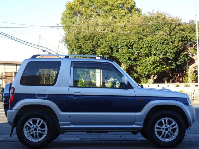 パジェロミニ エクシード　買取直販／後期モデル／パートタイム４ＷＤ／ターボ／ジオランダー／Ｂｌｕｅｔｏｏｔｈ／ナビ／ＴＶ／背面タイヤハードケースカバー（4枚目）