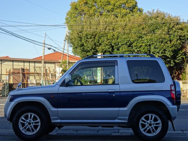 パジェロミニ エクシード　買取直販／後期モデル／パートタイム４ＷＤ／ターボ／ジオランダー／Ｂｌｕｅｔｏｏｔｈ／ナビ／ＴＶ／背面タイヤハードケースカバー（5枚目）