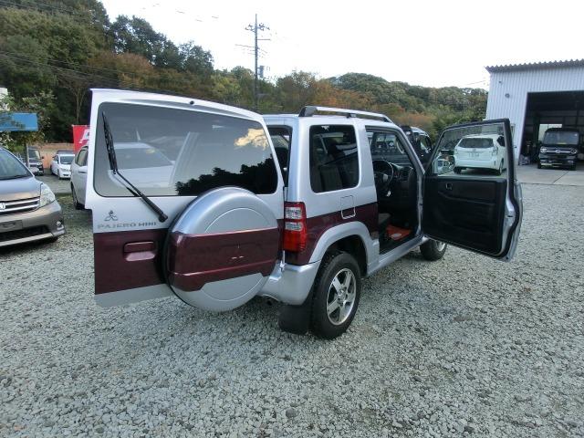 パジェロミニ エクシード 保証付き メモリナビ ナビ・テレビ フルセグ地デジTV 運転席助手席エアバック PW エアコンパワステ ABS付き PS キーレスエントリーキー 切替4WD アルミ 盗難防止装置 衝突安全ボディ エアバッグ(27枚目)