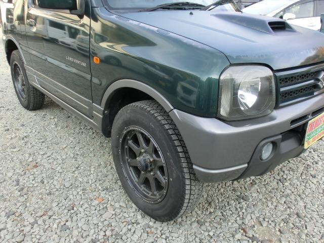 ジムニー ランドベンチャーパートタイム４ＷＤ　保証付き　前席パワーウインドウ　助手席エアバック　運転席エアバッグ　革シート　ＰＳ　衝突安全ボディ　ＡＢＳ付　シートヒータ　ＥＴＣ　ＡＴエアコン　４ＷＤ車　ターボー（4枚目）