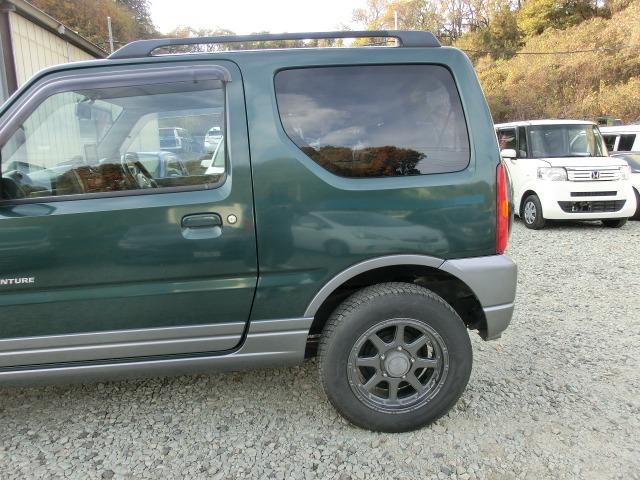 ジムニー ランドベンチャーパートタイム４ＷＤ　保証付き　前席パワーウインドウ　助手席エアバック　運転席エアバッグ　革シート　ＰＳ　衝突安全ボディ　ＡＢＳ付　シートヒータ　ＥＴＣ　ＡＴエアコン　４ＷＤ車　ターボー（17枚目）