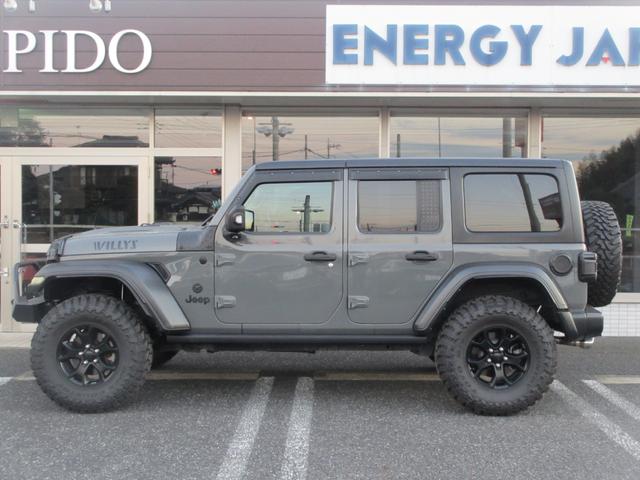 ジープ・ラングラーアンリミテッド ウィリス ラフカントリーリフトUP/JAOSマフラー/2024年製オープンカントリー35タイヤ/黒革シートカバー/前後バンパー/ロックレール/カスタムフードカバー+ラッチ+ドアバイザー/社外テール/背面キット(26枚目)