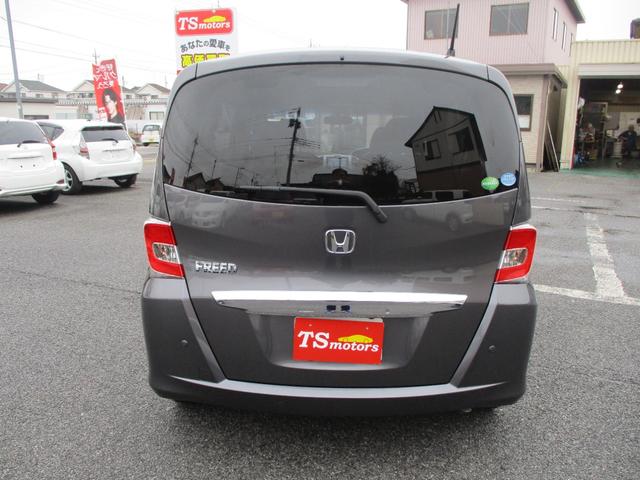 フリード Ｇ　ジャストセレクション　メモリ－ナビ　フルセグＴＶ　ＣＤ　ＤＶＤ　ＥＴＣ　フリップダウン後席モニタ－　オ－トライト　バックモニタ－　ＡＢＳ　盗難防止　インテリジェントキー　ＨＩＤライト　両側オートスライドドア（4枚目）