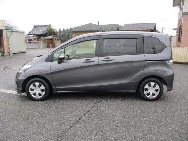 フリード Ｇ　ジャストセレクション　メモリ－ナビ　フルセグＴＶ　ＣＤ　ＤＶＤ　ＥＴＣ　フリップダウン後席モニタ－　オ－トライト　バックモニタ－　ＡＢＳ　盗難防止　インテリジェントキー　ＨＩＤライト　両側オートスライドドア（6枚目）