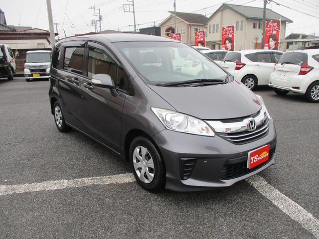 フリード Ｇ　ジャストセレクション　メモリ－ナビ　フルセグＴＶ　ＣＤ　ＤＶＤ　ＥＴＣ　フリップダウン後席モニタ－　オ－トライト　バックモニタ－　ＡＢＳ　盗難防止　インテリジェントキー　ＨＩＤライト　両側オートスライドドア（7枚目）