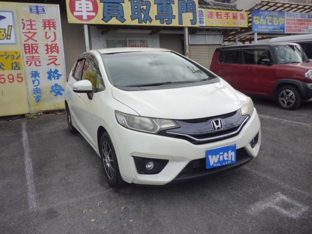 フィット １３Ｇ・Ｌパッケージ　ワンオーナー　禁煙車　プッシュスタート　純正ナビ　フルセグＴＶ　バックカメラ　ＬＥＤヘッドライト　ＥＴＣ　スマートキー　電動格納ウインカーミラー　タイミングチェーン車（4枚目）