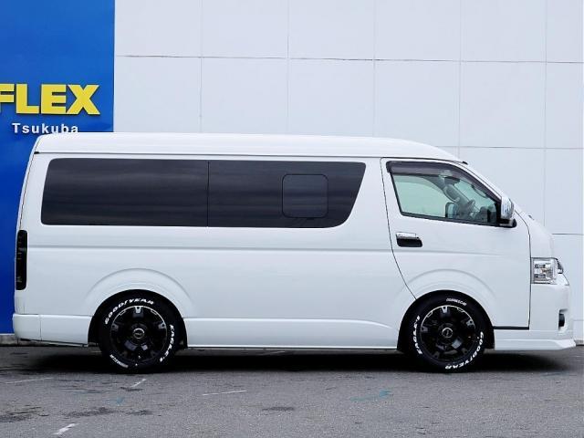 ハイエースワゴン  トヨタ純正ナビ ETC デジタルインナーミラー パノラミックビューモニター クリアランスソナー 100Vコンセント LEDヘッドライト ルーフスピーカー シートカバー DELF03 17inAW(4枚目)