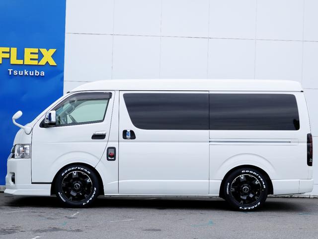 ハイエースワゴン  トヨタ純正ナビ ETC デジタルインナーミラー パノラミックビューモニター クリアランスソナー 100Vコンセント LEDヘッドライト ルーフスピーカー シートカバー DELF03 17inAW(5枚目)