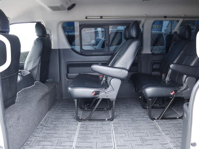 ハイエースワゴン  トヨタ純正ナビ ETC デジタルインナーミラー パノラミックビューモニター クリアランスソナー 100Vコンセント LEDヘッドライト ルーフスピーカー シートカバー DELF03 17inAW(31枚目)