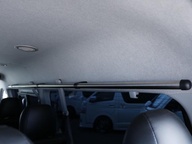 ハイエースワゴン  トヨタ純正ナビ ETC デジタルインナーミラー パノラミックビューモニター クリアランスソナー 100Vコンセント LEDヘッドライト ルーフスピーカー シートカバー DELF03 17inAW(34枚目)