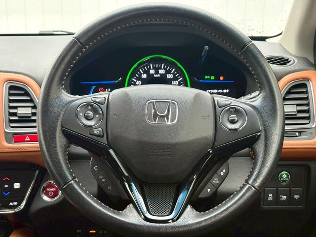 ヴェゼル ハイブリッドＺ　禁煙者　１オーナー　ＨＤＭＩ／ＵＳＢ入力端子　シティブレーキアクティブシステム　純正７型ナビ　ＤＶＤ再生　地デジ　ＢＬＵＥＴＯＯＴＨ　バックカメラ　純正アルミ　ルーフレール　シートヒーター　ＬＥＤライト　盗難防止装置　取扱説明書　保証書（24枚目）