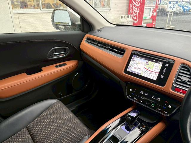 ヴェゼル ハイブリッドＺ　禁煙者　１オーナー　ＨＤＭＩ／ＵＳＢ入力端子　シティブレーキアクティブシステム　純正７型ナビ　ＤＶＤ再生　地デジ　ＢＬＵＥＴＯＯＴＨ　バックカメラ　純正アルミ　ルーフレール　シートヒーター　ＬＥＤライト　盗難防止装置　取扱説明書　保証書（32枚目）