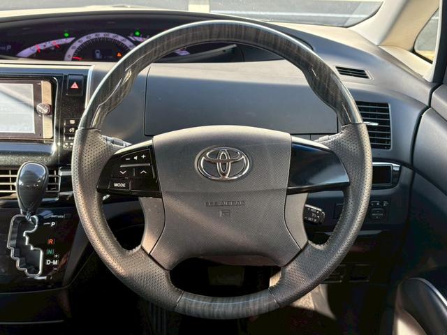 エスティマ アエラス プレミアムエディション 禁煙 純正ナビ&後席モニタ 両側電動スライドドア HIDヘッドライト&フォグランプ 電動ハーフレザーシート バックカメラ クルーズコントロール ビルトインETC ウッドステア 地デジ Bluetooth CD/DVD 保証書(24枚目)