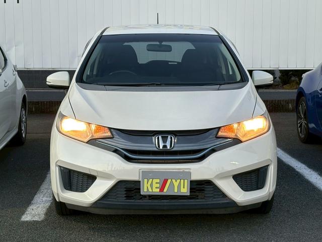 フィットハイブリッド Ｆパッケージ　佐野店下取車　ワンオーナー　社外ナビ　ワンセグＴＶ　ＣＤ／ＤＶＤ再生　バックカメラ　ＥＴＣ　プッシュスタート　スマートキー　スペアキー　ミラーウィンカー　ＡＵＸ端子　取扱説明書　記録簿　保証書（9枚目）