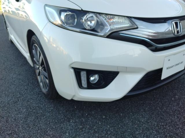 フィットハイブリッド Sパッケージ LEDヘットライト メモリナビ DVD再生 BTオーディオ ワンセグテレビ ナビTV リアカメラ クルコン Wエアバック Dレコ ETC付 イモビライザー オートライト 衝突安全ボディ 電動格納ミラー(10枚目)