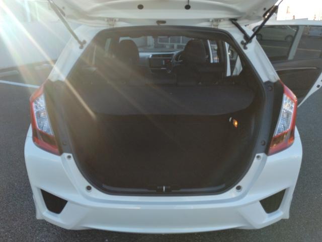 フィットハイブリッド Sパッケージ LEDヘットライト メモリナビ DVD再生 BTオーディオ ワンセグテレビ ナビTV リアカメラ クルコン Wエアバック Dレコ ETC付 イモビライザー オートライト 衝突安全ボディ 電動格納ミラー(32枚目)